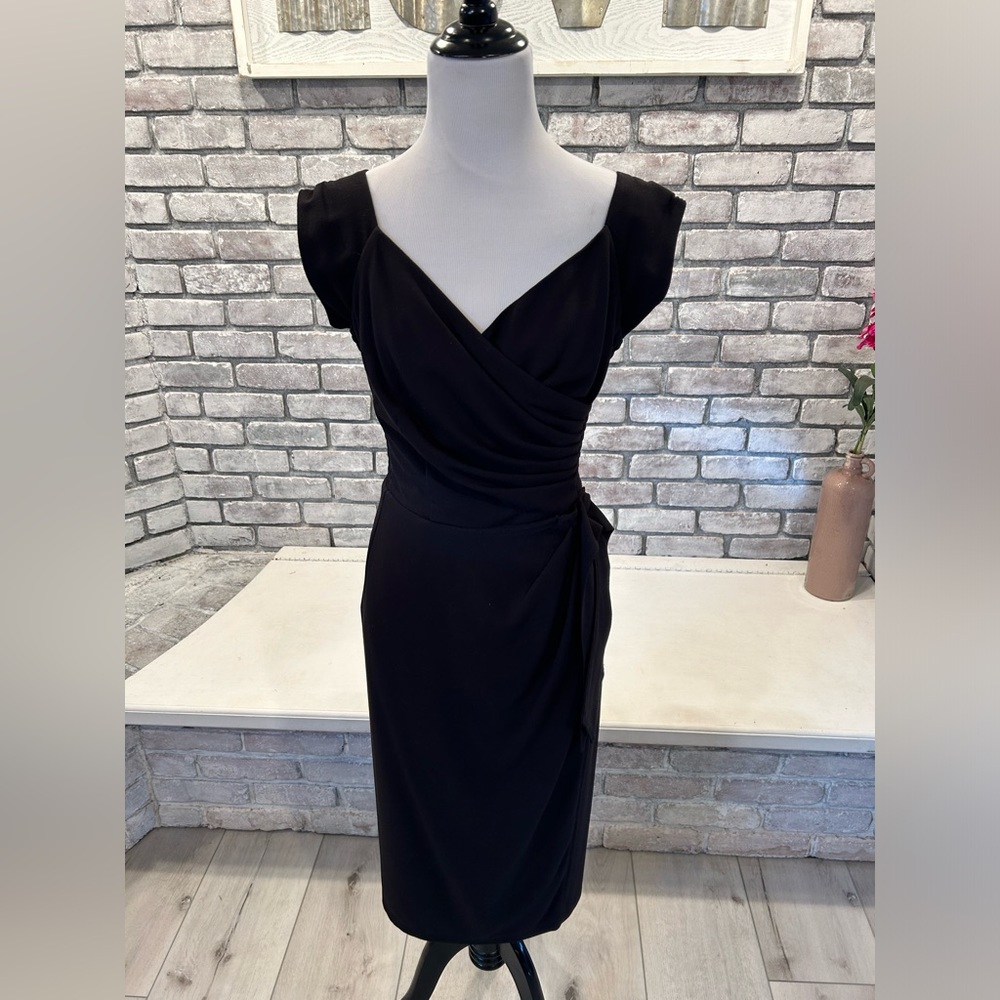 Sweetheart neck black crepe dress by U.K. designer Katya Wildman.